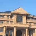 定西黄金麻别墅外墙干挂石材效果示例