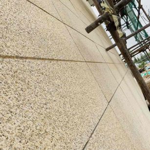 定西 黄金麻花岗岩荔枝面外墙干挂石材效果示例