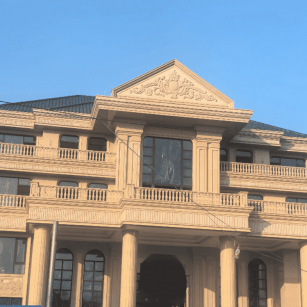 定西黄金麻别墅外墙干挂石材效果示例