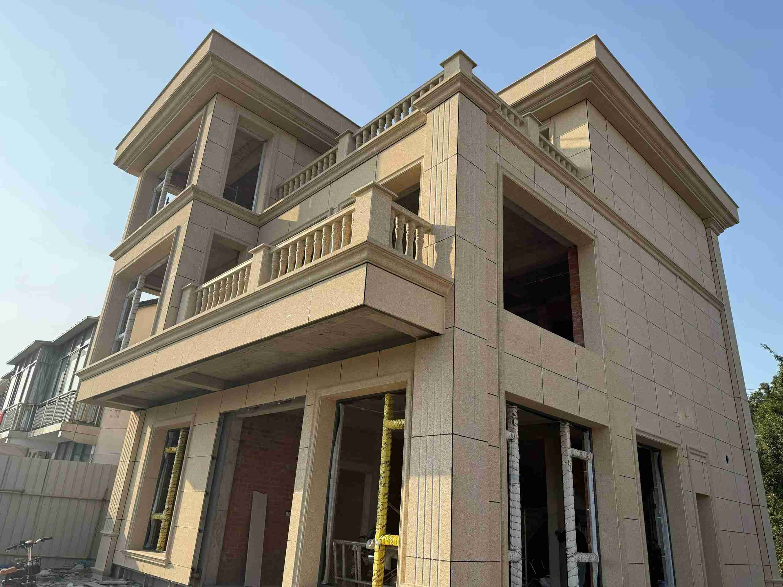 定西 黄金麻花岗岩石材荔枝面外墙干挂效果展示