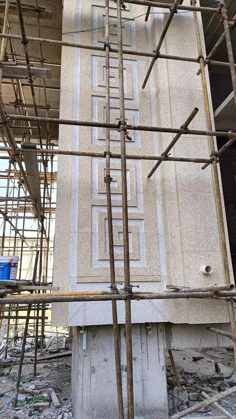 定西 黄金麻花岗岩别墅外墙干挂回纹造型效果